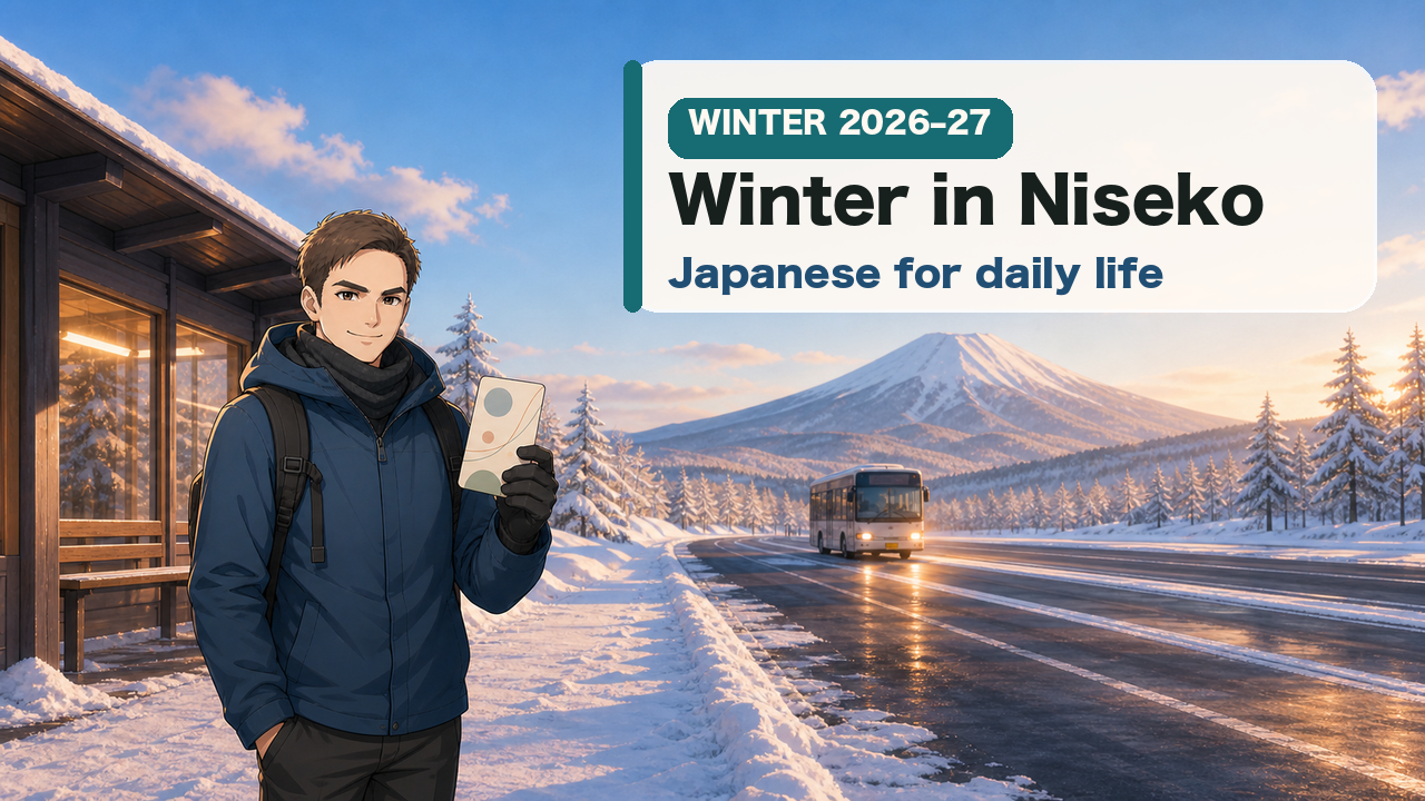 Keigo holding a Japanese guide card in snowy Niseko